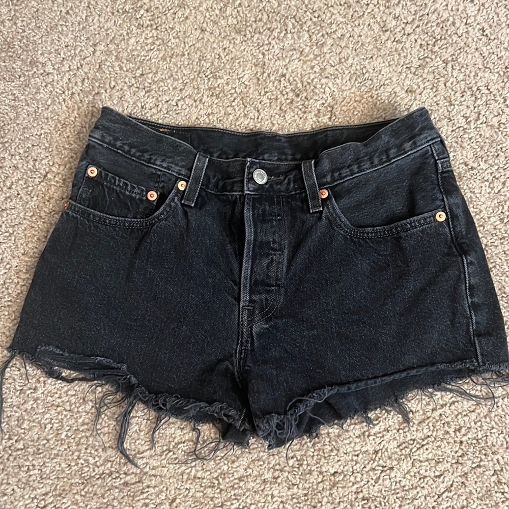 Distressed Levi’s black shorts